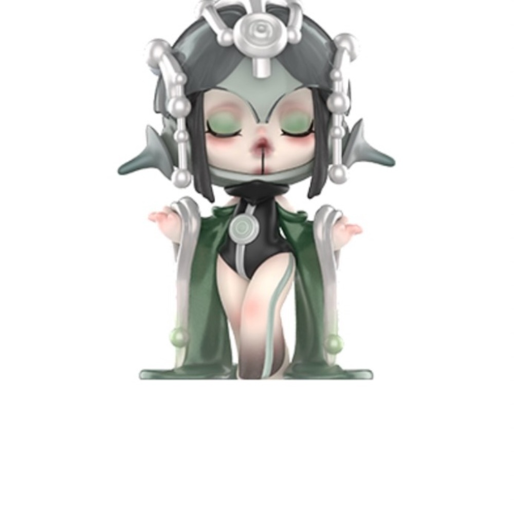 Green and Black Figurine